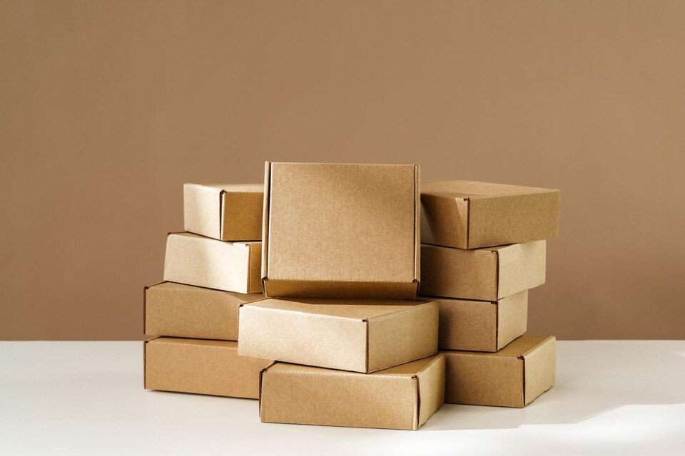 stacked-brown-cardboard-boxes-white-surface-large
